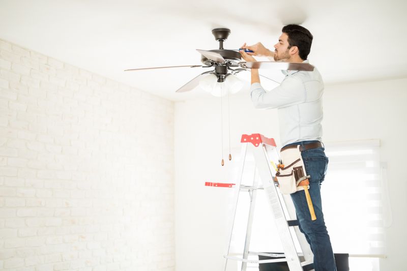 Handyman Fixing a Ceiling Fan