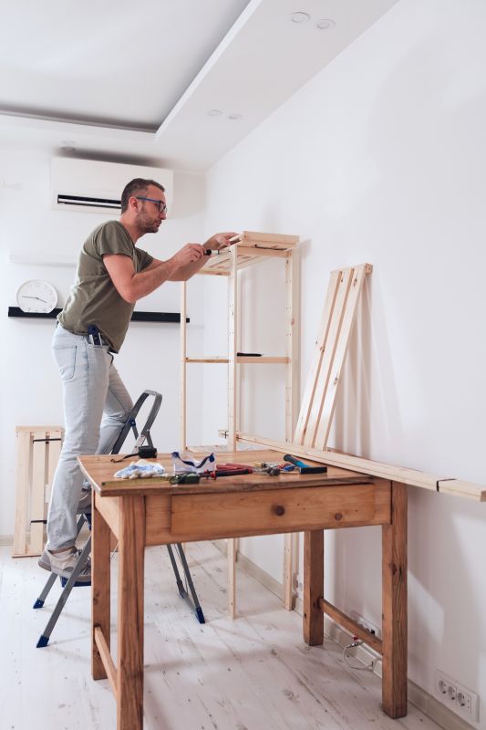 Handyman Installing a Shelf